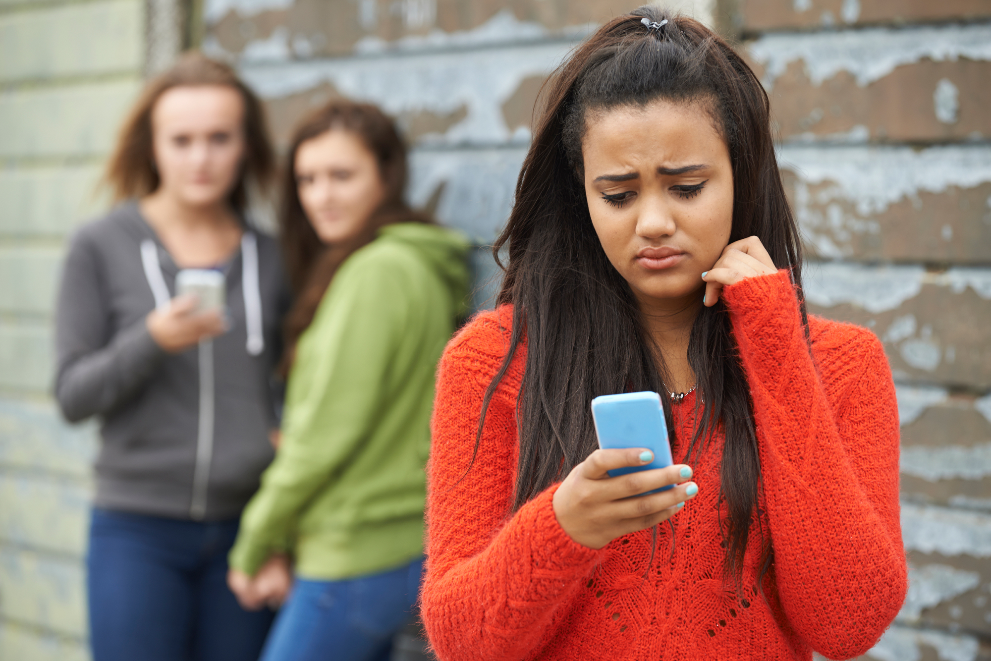 Teenage Girl Being Bullied via Text Message