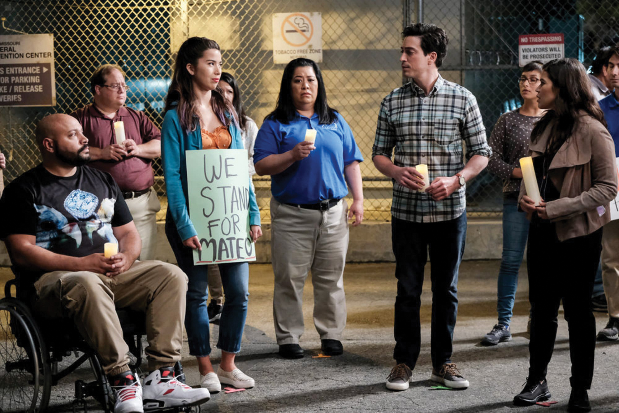 Image of a protest from NBC's Superstore TV show.