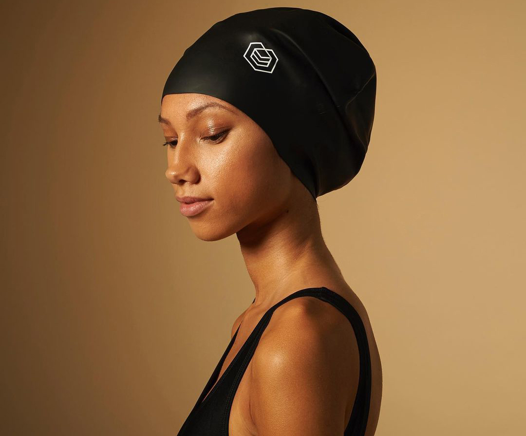 Side profile of a women of color wearing a soul cap