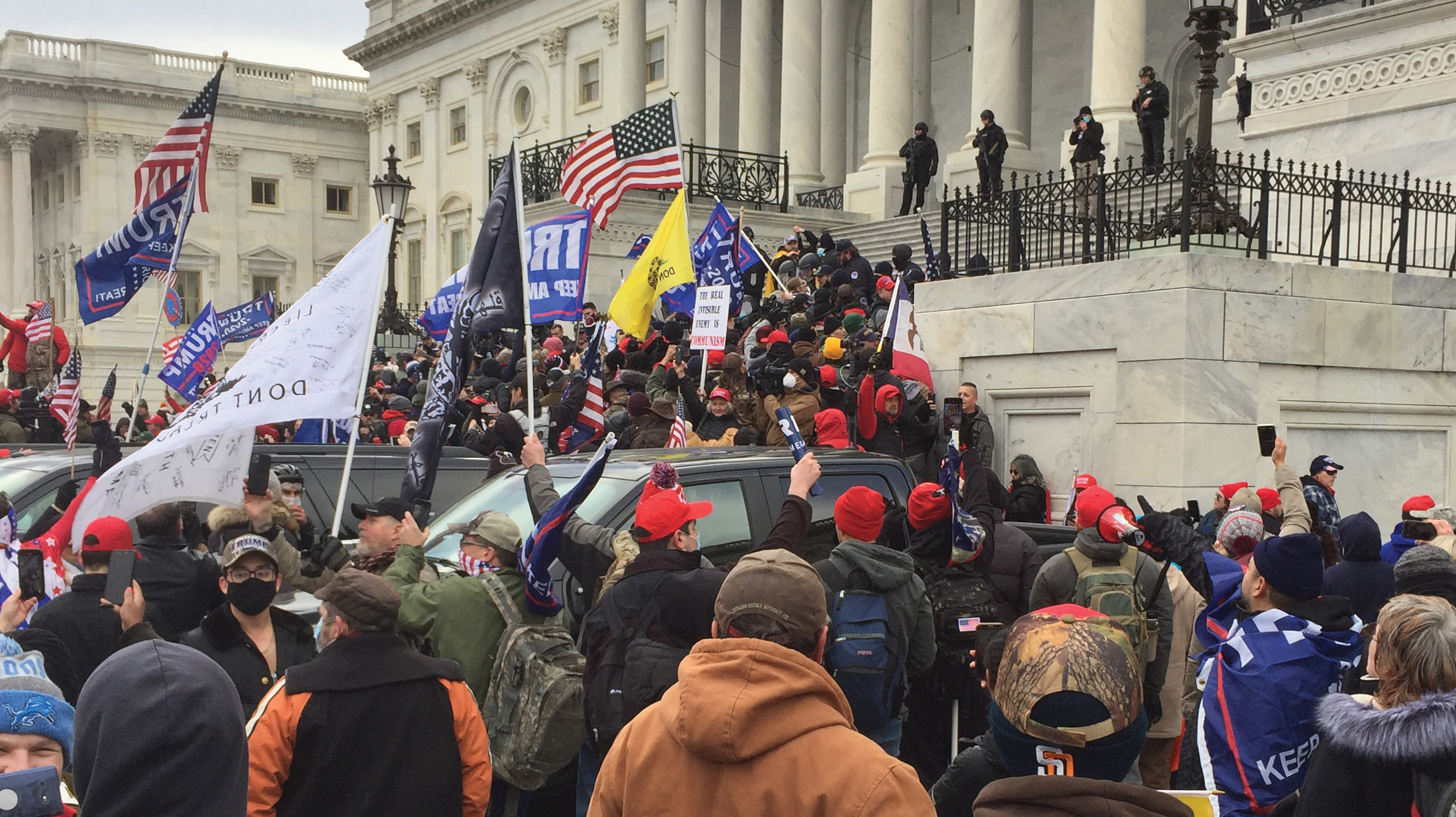 Trump supporters storming D.C. Capitol on January 6, 2021