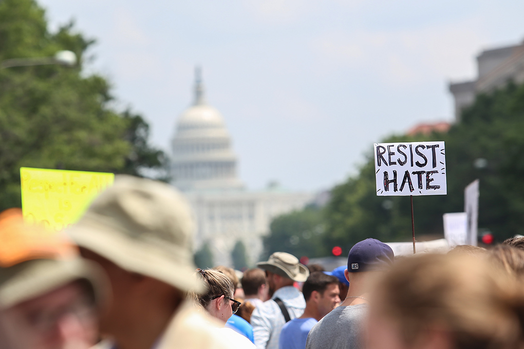 Resist Hate on Sign at Gathering
