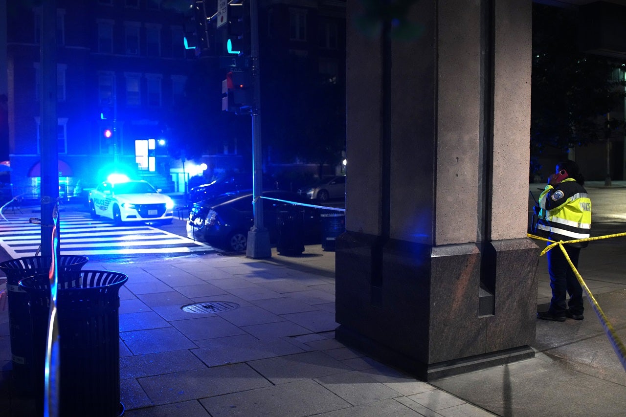 A police officer stands at the site of a fatal shooting at the Capital Jewish Museum on May 21, 2025, in Washington, DC