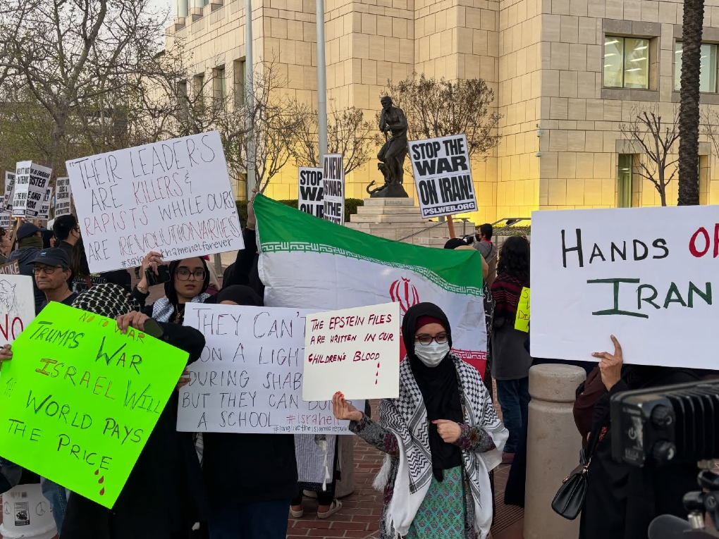 Screenshot: Antisemitic signs displayed by protesters in Santa Ana, California, on March 2, featuring overtly antisemitic and pro-Iranian regime messaging that included, “They can’t turn on a light during shabbat, but they can bomb a school #israhell #longlivetheislamicrepublic” and “‘Their leaders are killers & rapists while ours are revolutionaries’ #sayedkhameneiforever.” (Screenshot/Instagram)