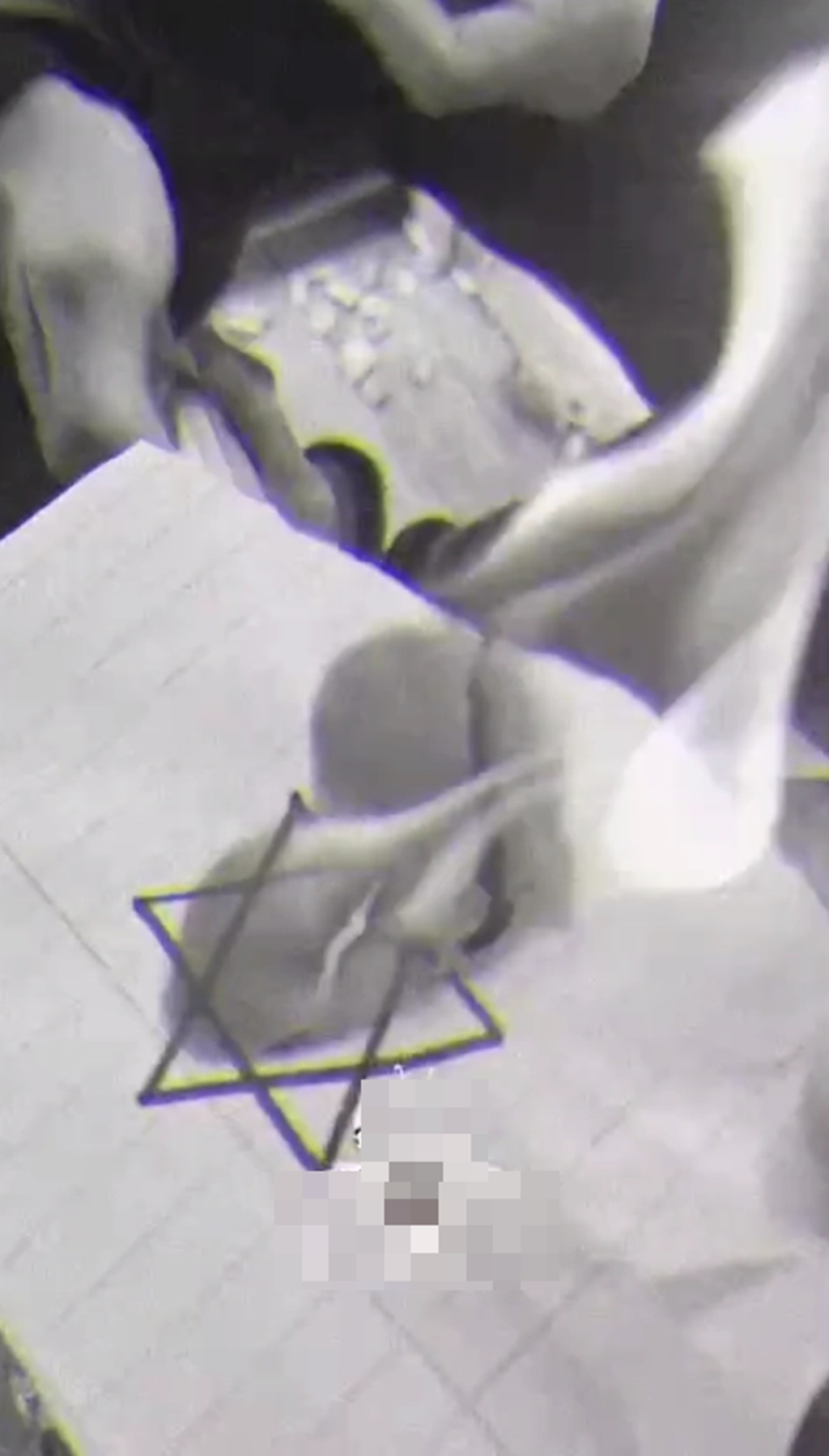 Com fan sign burning Star of David