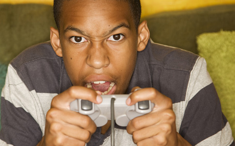 African-American Teenage Male Playing Video Games