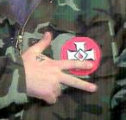 Ku Klux Klan (hand sign)