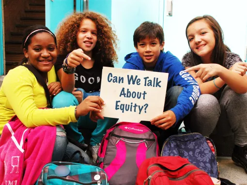 Diverse Students Holding Sign, "Can We Talk About Equity"