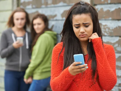 Teenage Girl Being Bullied via Text Message