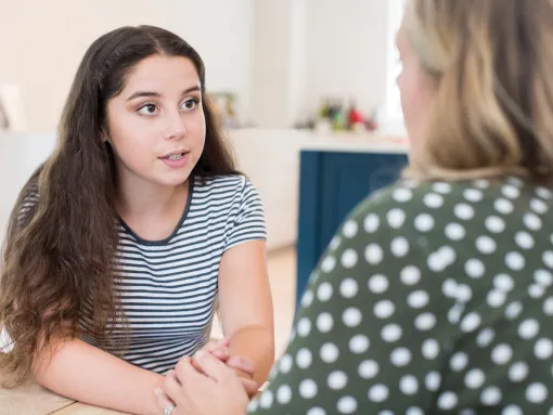 Mother Having Serious Conversation With Teenage Daughter