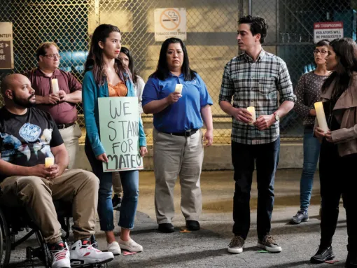 Image of a protest from NBC's Superstore TV show.