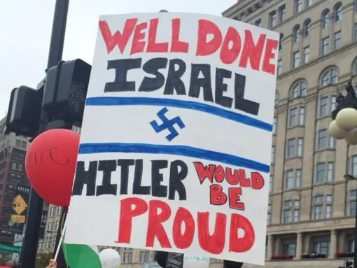 A poster that reads "Well done Israel, Hitler would be proud
