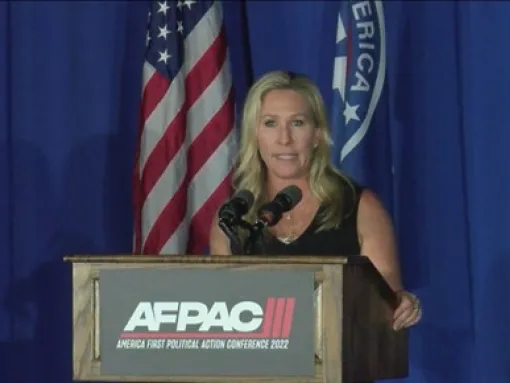 Rep. Marjorie Taylor Greene speaking at AFPAC, an annual white supremacist conference.
