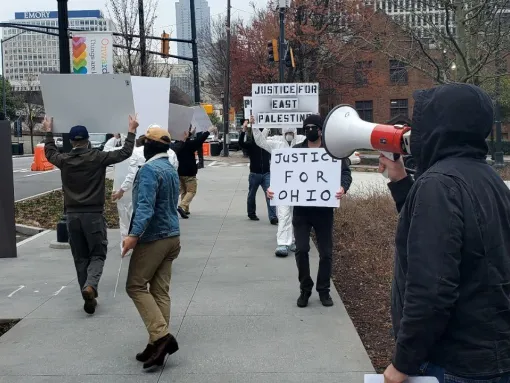 Approximately a dozen individuals affiliated with the white supremacist National Justice Party protested outside of Norfolk Southern corporate headquarters on February 25, 2023. (NJP photo)