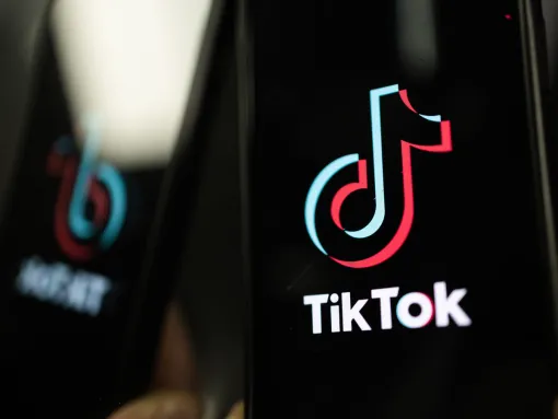 tiktok logo on a phone with reflection