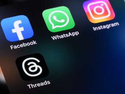 An illustrative photo of the Facebook, WhatsApp, Instagram and Threads apps by Meta Platforms on an iPhone, August 2023