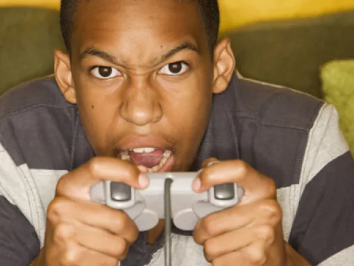 African-American Teenage Male Playing Video Games