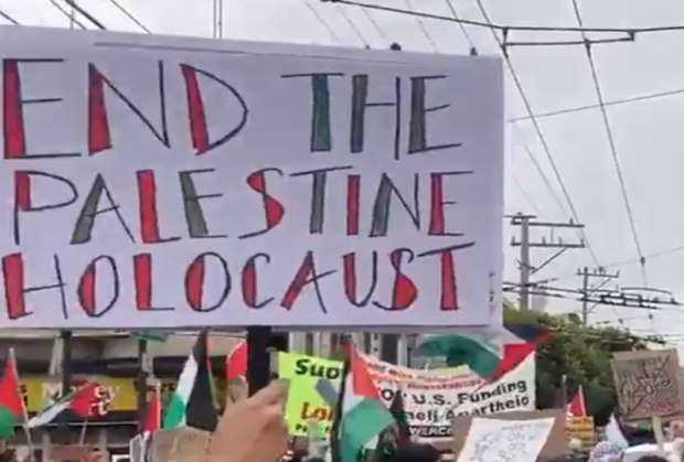 Antisemitic poster at anti-Israel protest