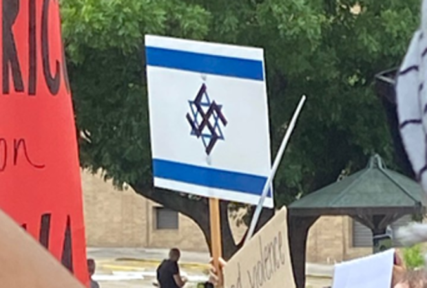 Antisemitic sign at anti-Israel protest