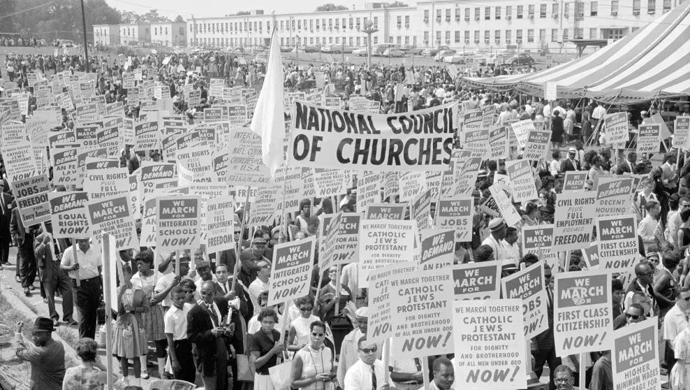 Demonstrators protest against civil rights abuses against African Americans and other disenfranchised groups