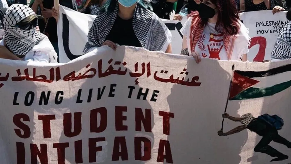 Anti-Israel protesters display a banner that reads "Long Live the Student Intifada" during a Nakba Day protest in Los Angeles, CA on May 19, 2024.