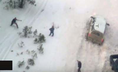 Helicopter footage of shooting of "LaVoy" Finicum (middle) as he seems to reach for a weapon. 