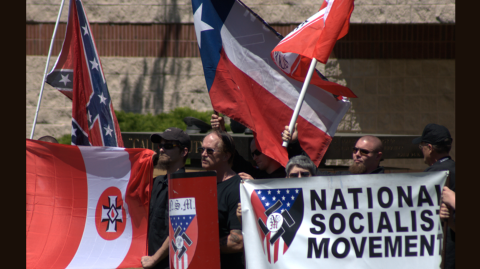 Group of people holding flags
